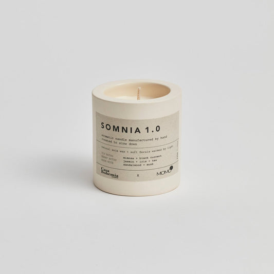 Somnia 1.0 aromatic candle by Momo Cotton in cream vessel with natural soy wax on white background