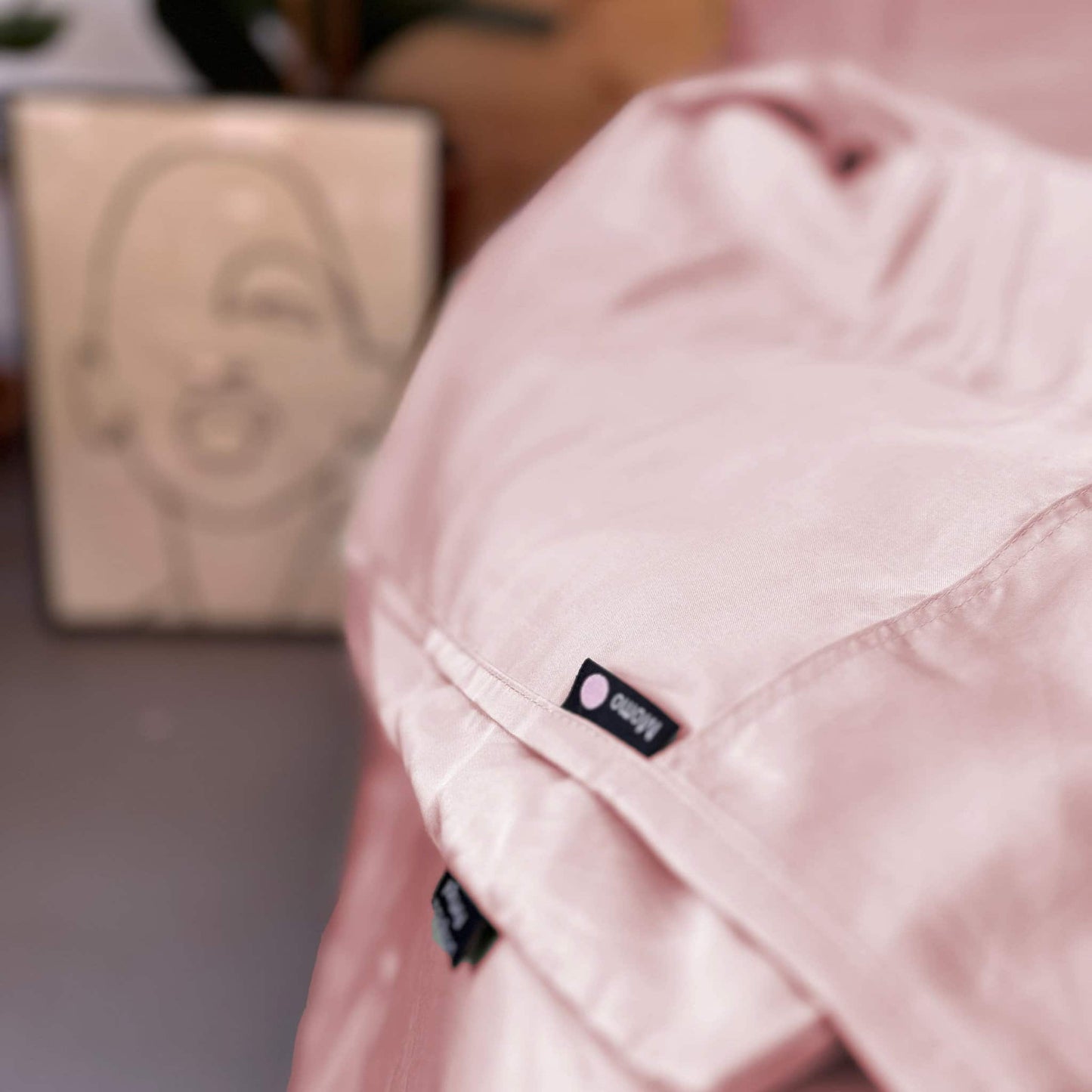 Close-up of pink bamboo bedding set – duvet, sheets and pillows, soft, breathable and sustainable
