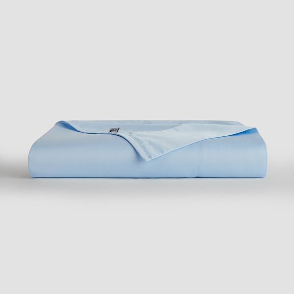 Baby blue top sheet bamboo bedding by Momo Cotton – 300 thread count satin, soft, breathable and sustainable.